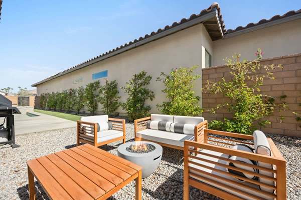 Fire pit and outdoor dining makes evening gatherings under the stars feel extra special.
