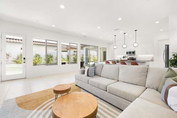 Open living space with huge windows bringing the sunshine inside.