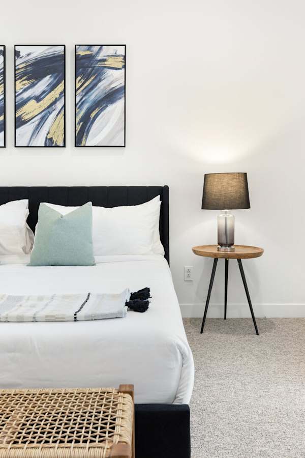 The primary suite invites you to sleep in every single morning.