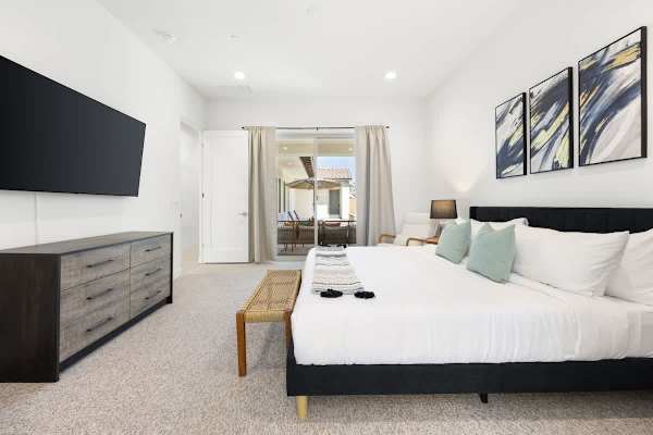 Primary bedroom offers a serene space to retreat after desert adventures.