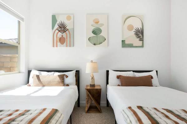 Third bedroom with two twin beds perfectly for kids or friends traveling together.