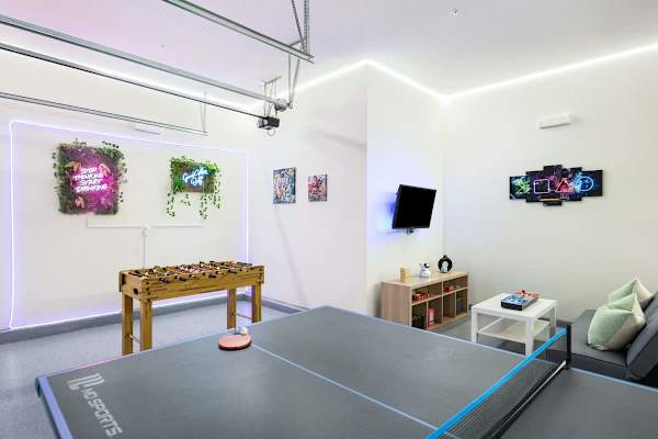Game room with foosball table.