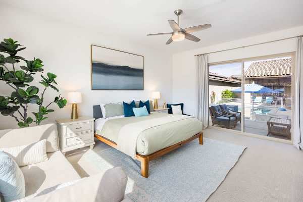 King bedroom with patio access makes it easy to enjoy your morning coffee in bed or outside.