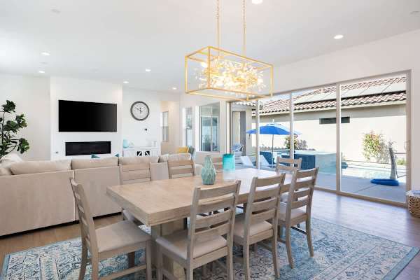 Bright dining space with pool views connects you to the outdoors.