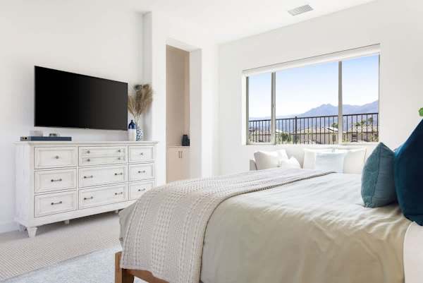 Primary suite with TV gives you plenty of storage and a calm space.