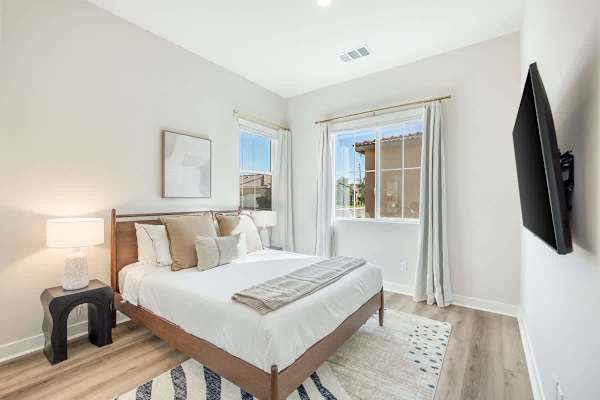 Third bedroom offers natural light, mountain views, and a quiet spot to recharge.