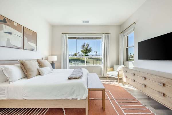 Wake up to mountain and golf course views in this bright bedroom.