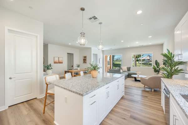 The large granite island is perfect for all of your homemade creations.