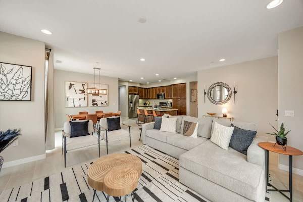 The living room couch converts into a full size sofa sleeper!
