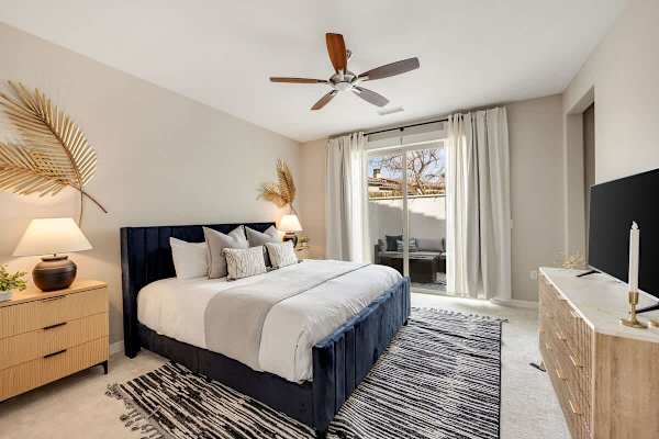Enjoy comfort and entertainment in the Master Suite with a TV.