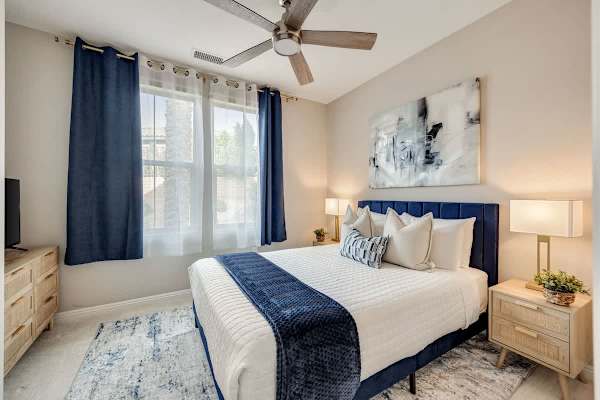 Rest and recharge in Bedroom 2 with a comfortable queen bed.