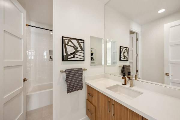 Another full bathroom upstairs with tub-shower combo for easy access from all rooms.