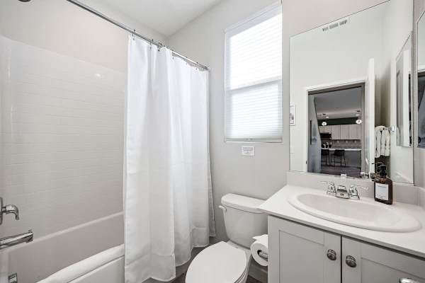 Lower level convenience —fresh towels and space for everyone.