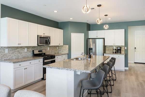 The home features a fully stocked kitchen with everything you need to craft the perfect meal.