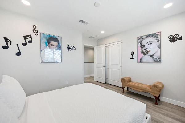 Bedroom has a touch of music and features art frames of legends!