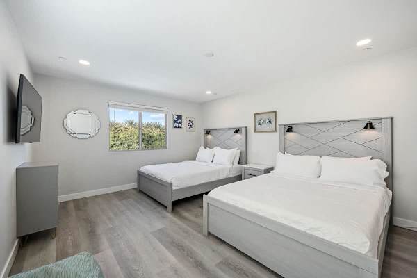 Bedroom features two Queen-sized Beds.