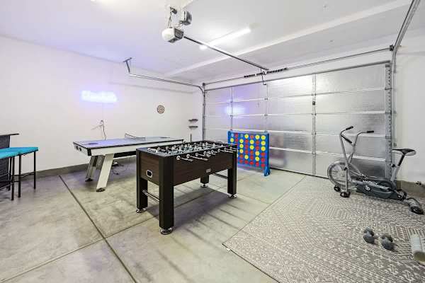 Private game space with foosball table perfect for entertaining guests anytime.