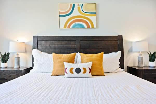 Spacious master suite illuminated by plenty of natural light.