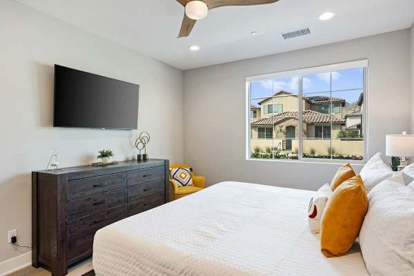 Bright and airy master suite filled with natural light.