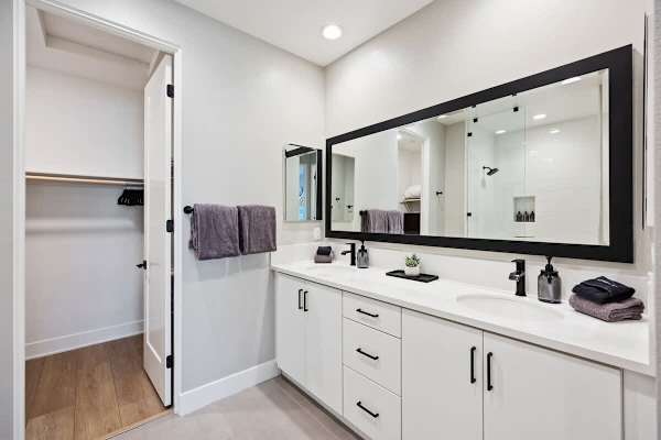 Master suite bathroom with dual vanities for added convenience.