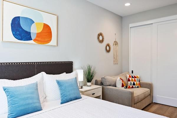 Bright and Comfortable Bedroom 2 with Double Bed and Additional Sofa Bed.
