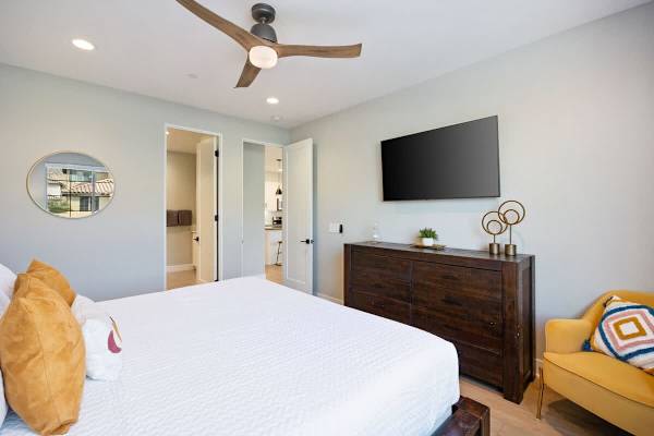 Comfortable Master suite with TV—perfect for movie nights in bed.