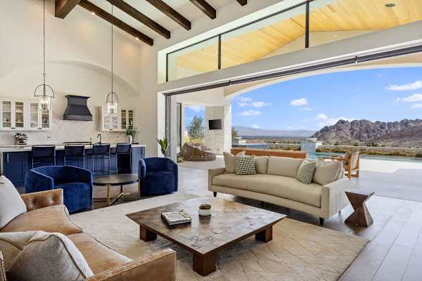 Vaulted ceilings and wraparound windows frame incredible desert mountain views.