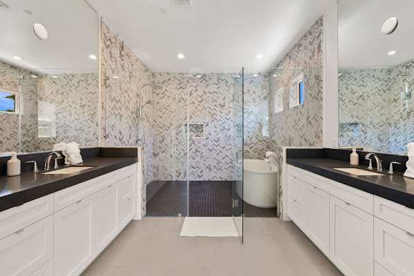 Luxurious master suite bathroom with modern fixtures and ample space.