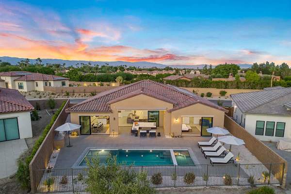 Take in a stunning aerial view of the entire property and its surroundings.