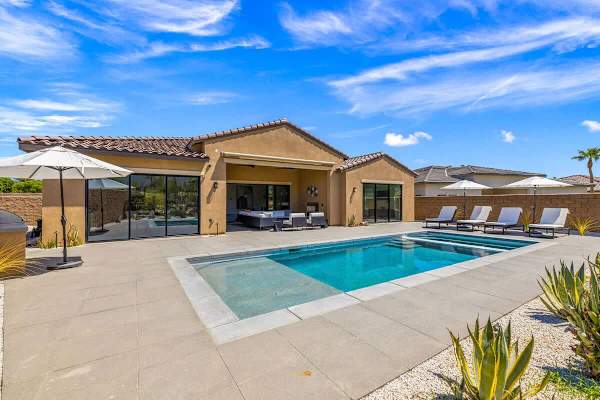 Backyard oasis with a pool perfect for fun and relaxation.