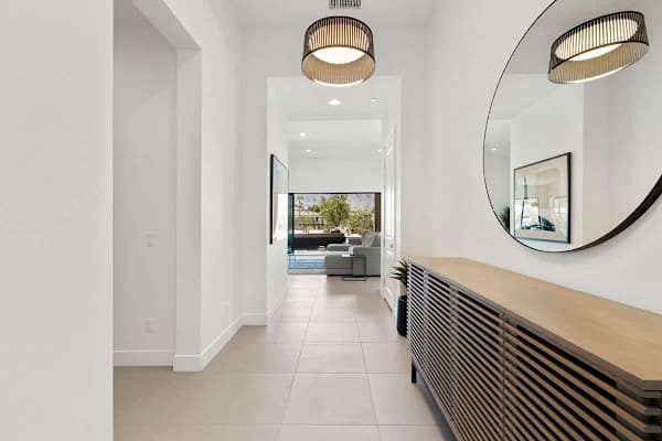 Hallway with views straight through to the backyard pool.