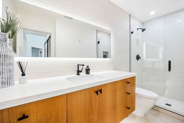 Hallway Bathroom located right across bedroom 3 features modern finishes.