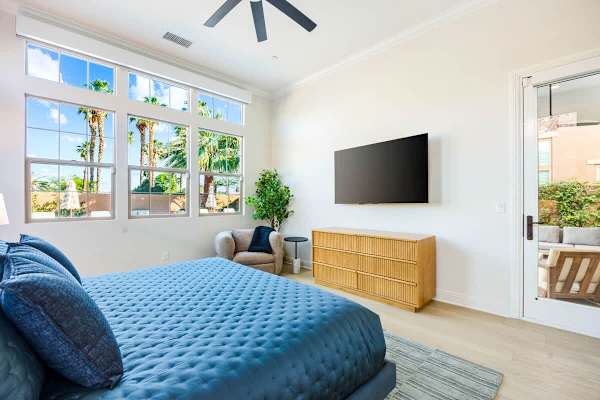 Spacious primary suite with king bed offers a calm retreat after long desert days.