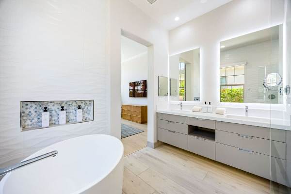 Primary bathroom with soaking tub and walk-in shower feels like your own private sanctuary.