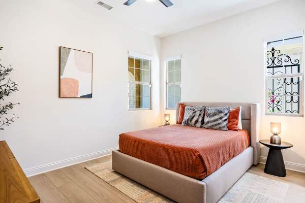 Suite 2 features a queen bed, provides a comfortable space for extra guests.