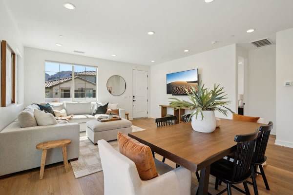 Bright white kitchen with stainless appliances and everything you need makes cooking meals just like being at home.