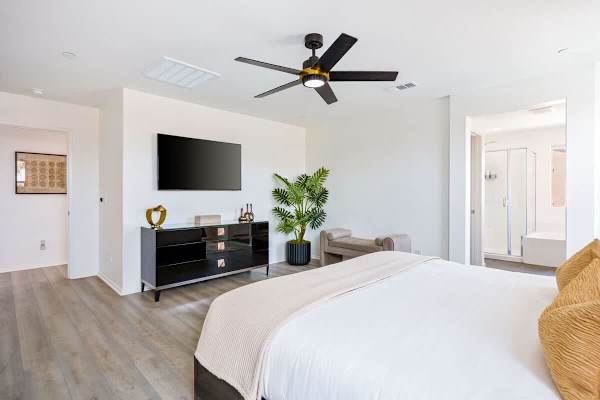 King bedroom with modern furniture.