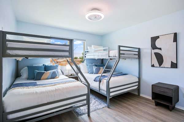 Bedroom 2: 2x Twin-Over-Full Bunk Beds, Ceiling Fan, Reach-In Closet