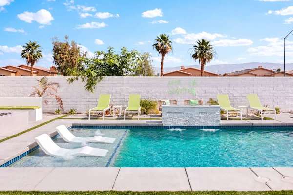 Private pool with built-in spa and sun shelf.