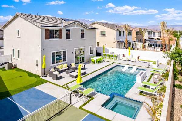 Glass sliding doors from the patio connect you directly to the pool!