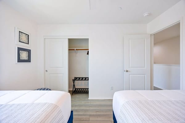 Fourth bedroom with two queen beds.