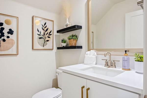 A convenient half bath near the main living areas for easy guest access.