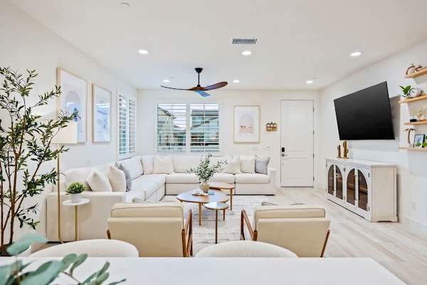 The open floor plan flows beautifully from living room to dining area to kitchen.