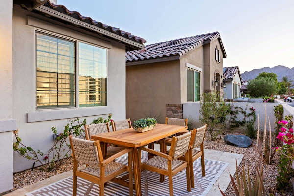 An outdoor dining table for six lets you enjoy meals in the fresh desert air.