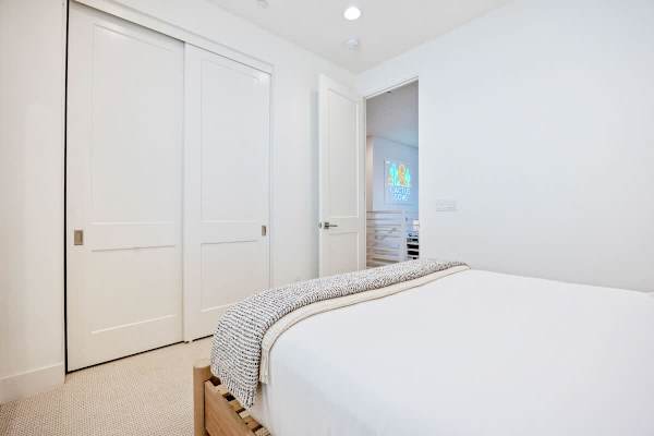 A reach-in closet with plenty of hanging space and storage for your vacation clothes.