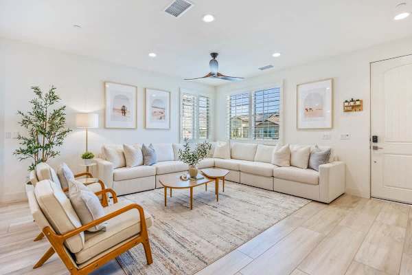 Bright and airy living space with comfortable seating for the whole group to spread out.