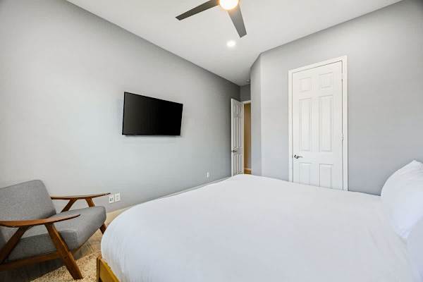 Comfortable bedroom featuring a TV in Bedroom 3.