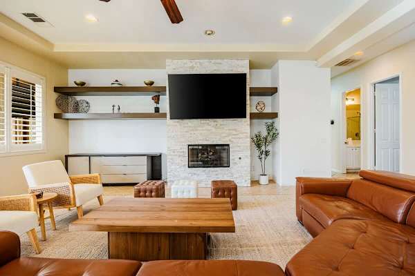 A welcoming living room where everyone can relax and watch TV.