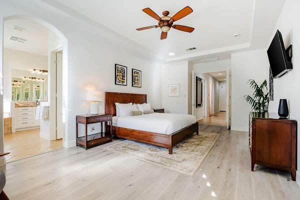The Master Suite features a king-size bed.