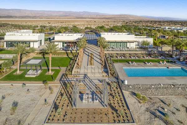 View of the community layout featuring palm-lined walkways and shared amenities